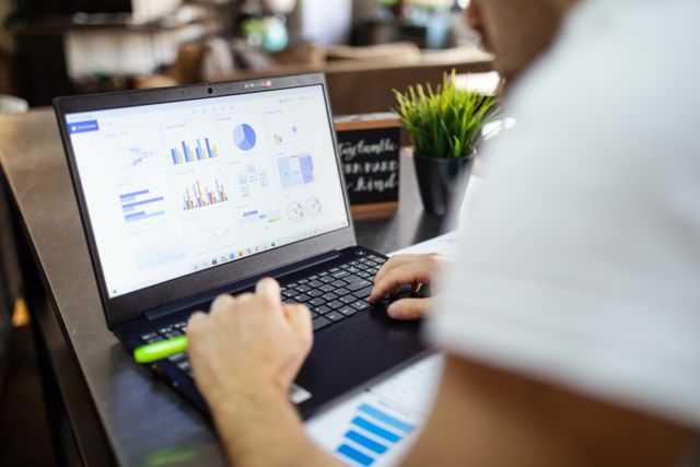 a person looking at charts